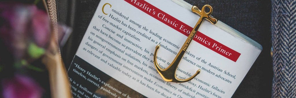 image of person holding book with pageanchor
